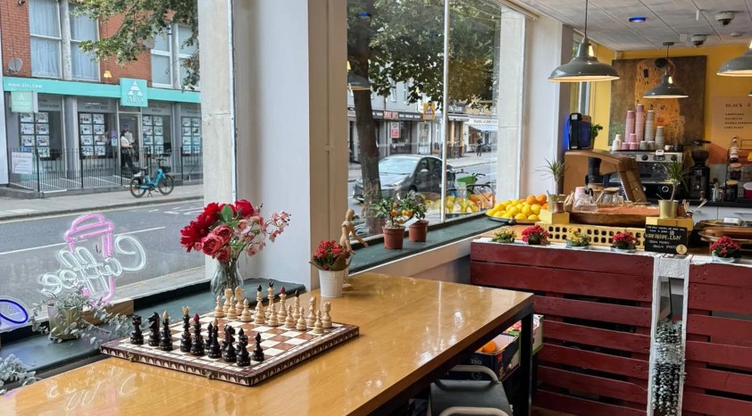 Chess board set up on a window table